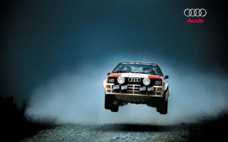 Car jumping dark background foggy - the front of the car free wallpaper