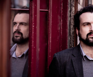 Bearded man red door mirror - a red door free wallpaper