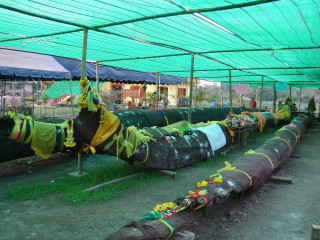 Pipes tent field grass dirt - a woodcut free wallpaper
