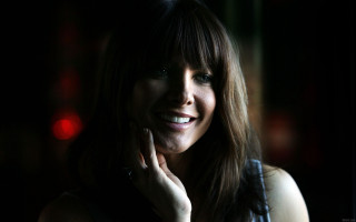 Woman smiling hand face black - free portrait wallpaper for desktop