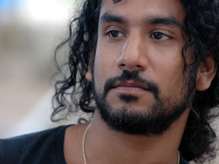 Bearded man serious necklace looking - his neck free wallpaper