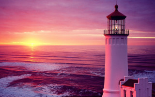 Lighthouse sunset water pink sky - rim light free wallpaper for desktop
