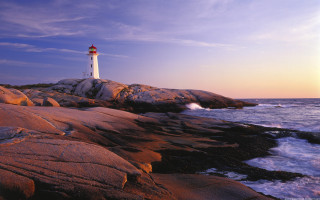 Lighthouse rocky shore waves crashing 2 - a rocky shore free wallpaper for desktop