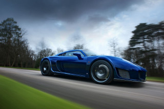 Blue sports car driving cloudy 3 - a dark cloud free wallpaper for desktop