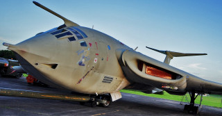 Airplane tarmac grass trees sky - barron storey free wallpaper