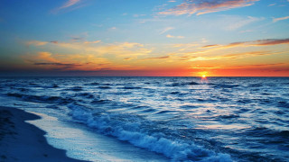 Sunset ocean waves boat distance 2 - a boat in the distance free wallpaper