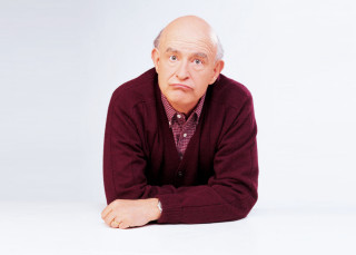 Man sitting floor arms crossed - character portrait free wallpaper