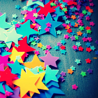 Colorful stars pile table black - free stars wallpaper for tablet