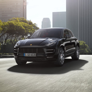 Black porsche cayenne city street 2 - tall building free wallpaper for tablet
