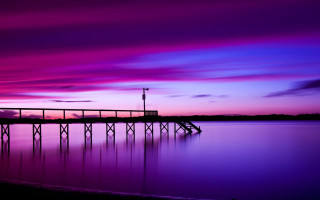 Pier lake purple sky sunset - a light house free wallpaper