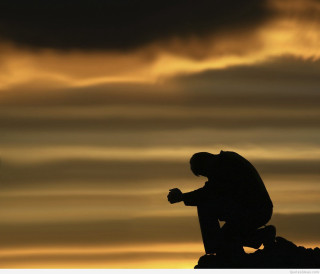 Silhouette man sitting rock cross - precisionism free wallpaper for desktop