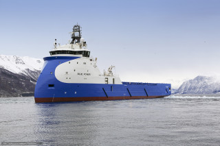 Large blue and white boat - white cloud free wallpaper