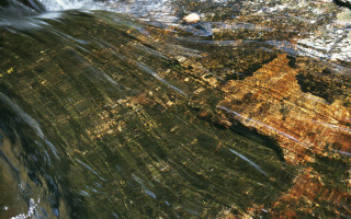 River waterfall bird cityscape night - over the water free wallpaper