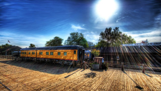 Train fence trees clocktower cityscape - hdri free wallpaper