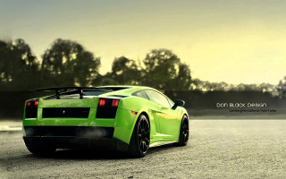 Green sports car parked road 2 - a green sports car free wallpaper for desktop