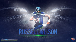 Russell wilson wallpaper football player - a stadium in the background free wallpaper