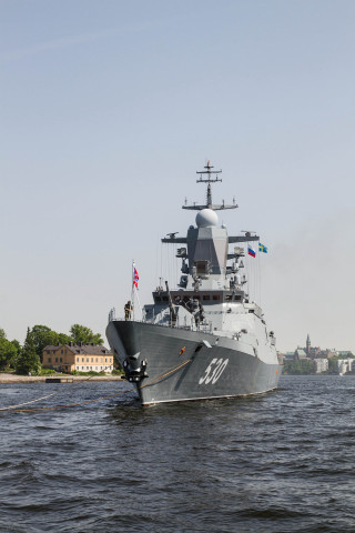 Large gray boat water shoreline - the front of it free wallpaper