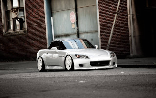 White sports car building street - a street corner free wallpaper for desktop