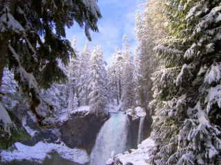 Waterfall snow trees blue sky - a waterfall free wallpaper