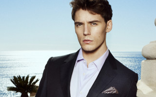 Man suit water building palm - a palm tree in the background free wallpaper