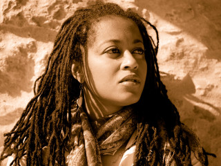 Woman dreadlocks rock wall scarf - her neck and a scarf free wallpaper