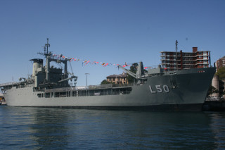 Large gray ship water dock - a flag free wallpaper