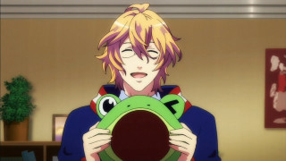 Person holding frog room plant - a plant in the background free wallpaper