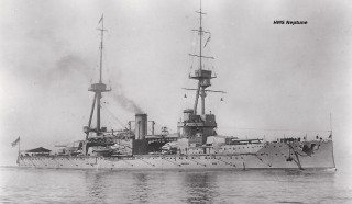 Large ship floating water next - top of a body free wallpaper