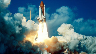 Space shuttle launching smoke billowing - a space shuttle free wallpaper