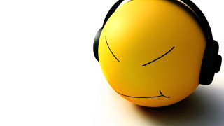 Yellow ball headphone smiley face - a smiley face free wallpaper
