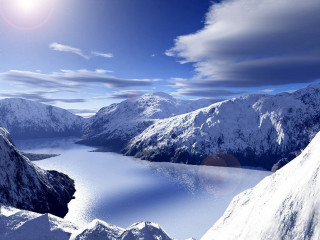 Snow covered mountain lake cloudy - a lake in the middle of it free wallpaper for desktop