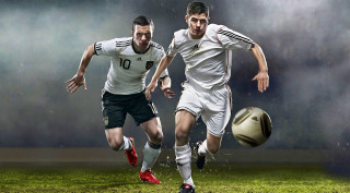 Soccer players running ball rain - smoke behind them free wallpaper
