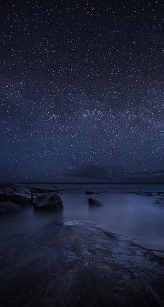 Night sky stars water rocks 2 - a few star above free wallpaper
