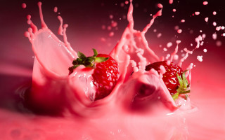 Strawberry splashing pink liquid water - a strawberry free wallpaper