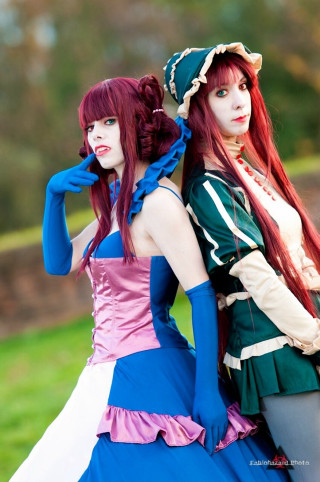 Two women costumes posing picture - two woman free wallpaper for mobile