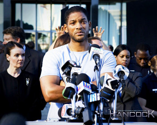 Man microphones crowd hands up - verdadism free wallpaper