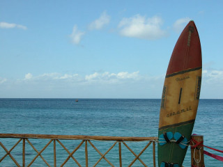 Surfboard fence ocean boat distance - leaning free wallpaper for desktop