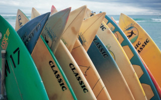 Surfboards beach ocean cloudy sky - vintage free wallpaper