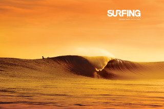 Surfer riding wave ocean sunset 3 - a surfer free wallpaper