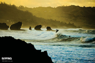 Surfing wave ocean rocky shore - a yellow sky free wallpaper