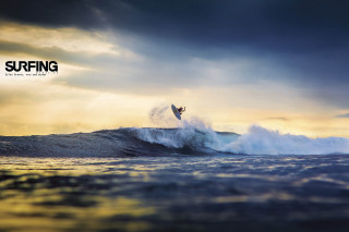 Surfer riding wave ocean sunset 2 - dawn free wallpaper
