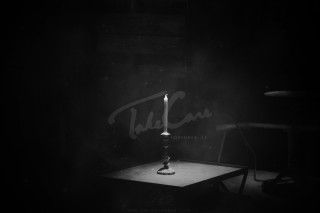 Candle lit table dark chair - a table in the dark free wallpaper
