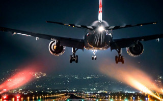 Jetliner night sky runway glowing - a microscopic photo free wallpaper