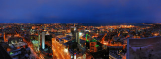 City night lights buildings blue 7 - panoramic view free wallpaper