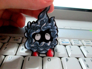 Person holding toy keyboard computer - a small toy free wallpaper