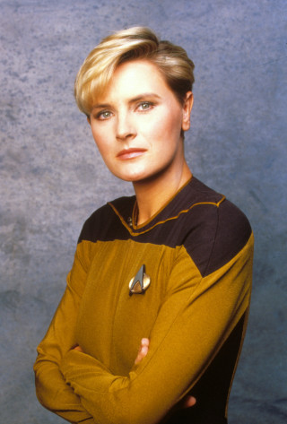 Woman star trek uniform photo - her arm free wallpaper for mobile