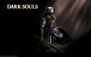 Man knight outfit sitting rock - his hand and a helmet free wallpaper