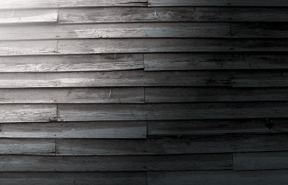 Black white wooden wall clock - a wooden wall free wallpaper