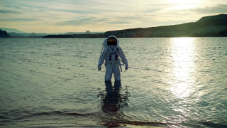 Man space suit water mountain - science fiction free wallpaper