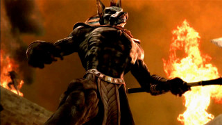 Man costume sword fire background - a man in a costume holding free wallpaper